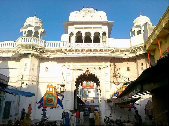 Shrinathji Temple Nathdwara haveli-style facade with devotees gathered for darshan
