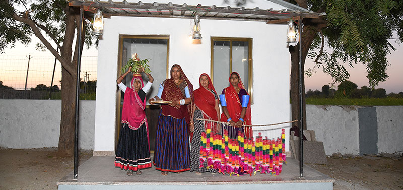 Rabari village near Jawai with granite hills in the background