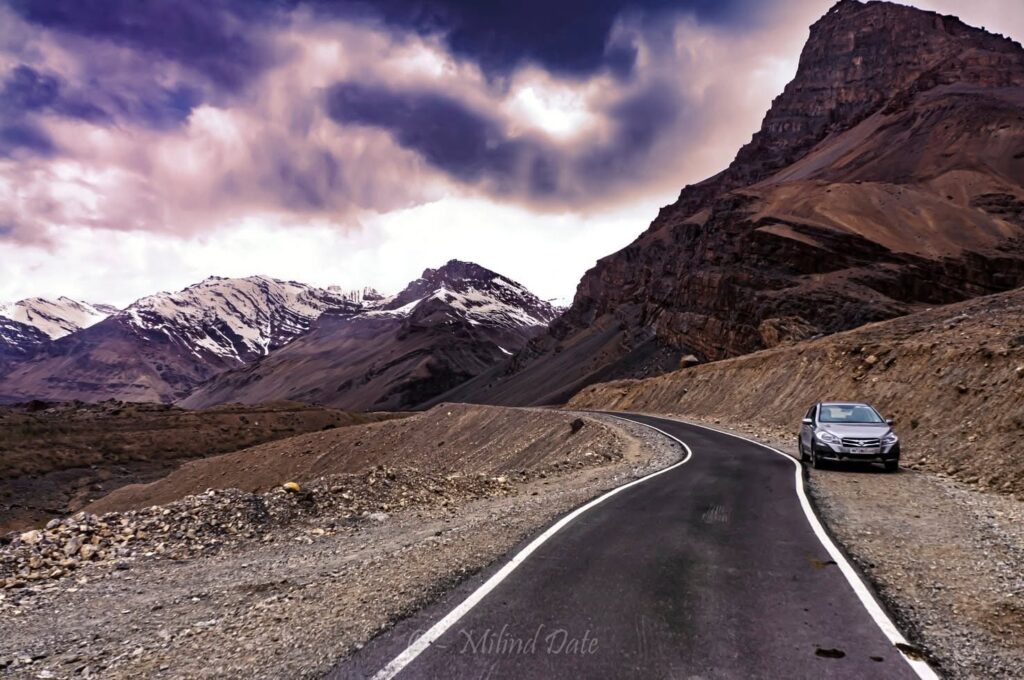  Road on a Kaza to Komic day trip winding through Spiti's barren mountains