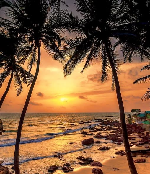 Golden sunset over a North Goa beach, one of the best places to visit in North Goa