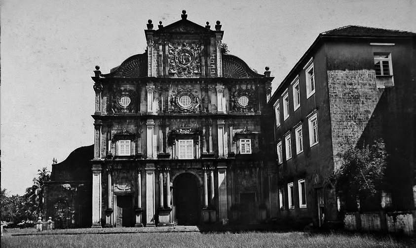 Historic churches in a green courtyard, the heart of Old Goa sightseeing