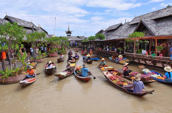 Wooden stalls and boats at Pattaya Floating Market