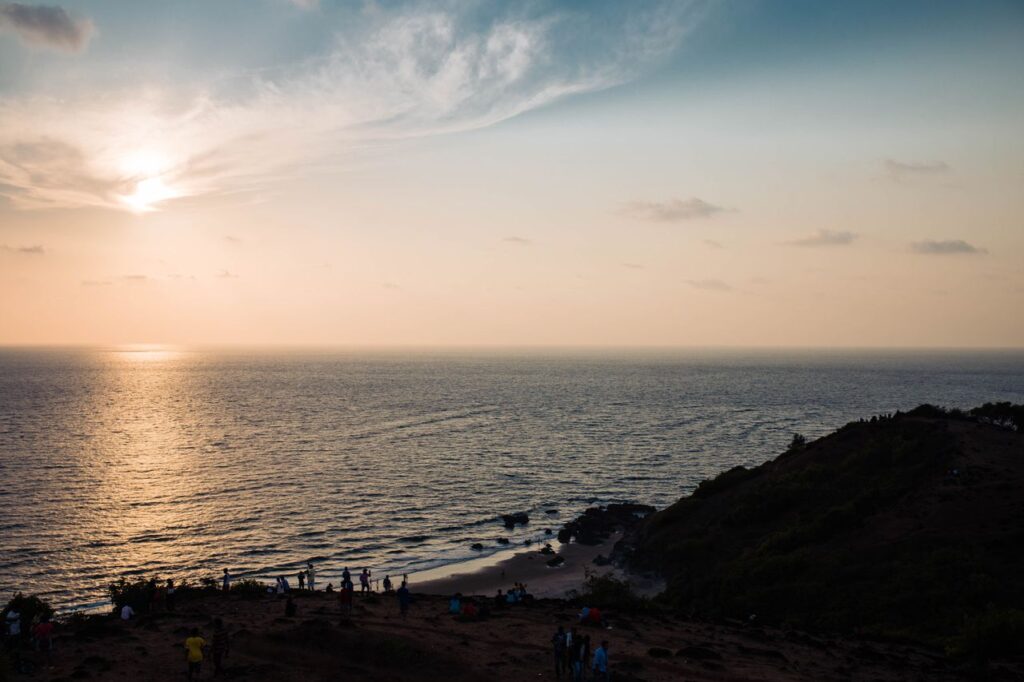 Beach at sunset in Goa, a classic start to things to do in Goa at night